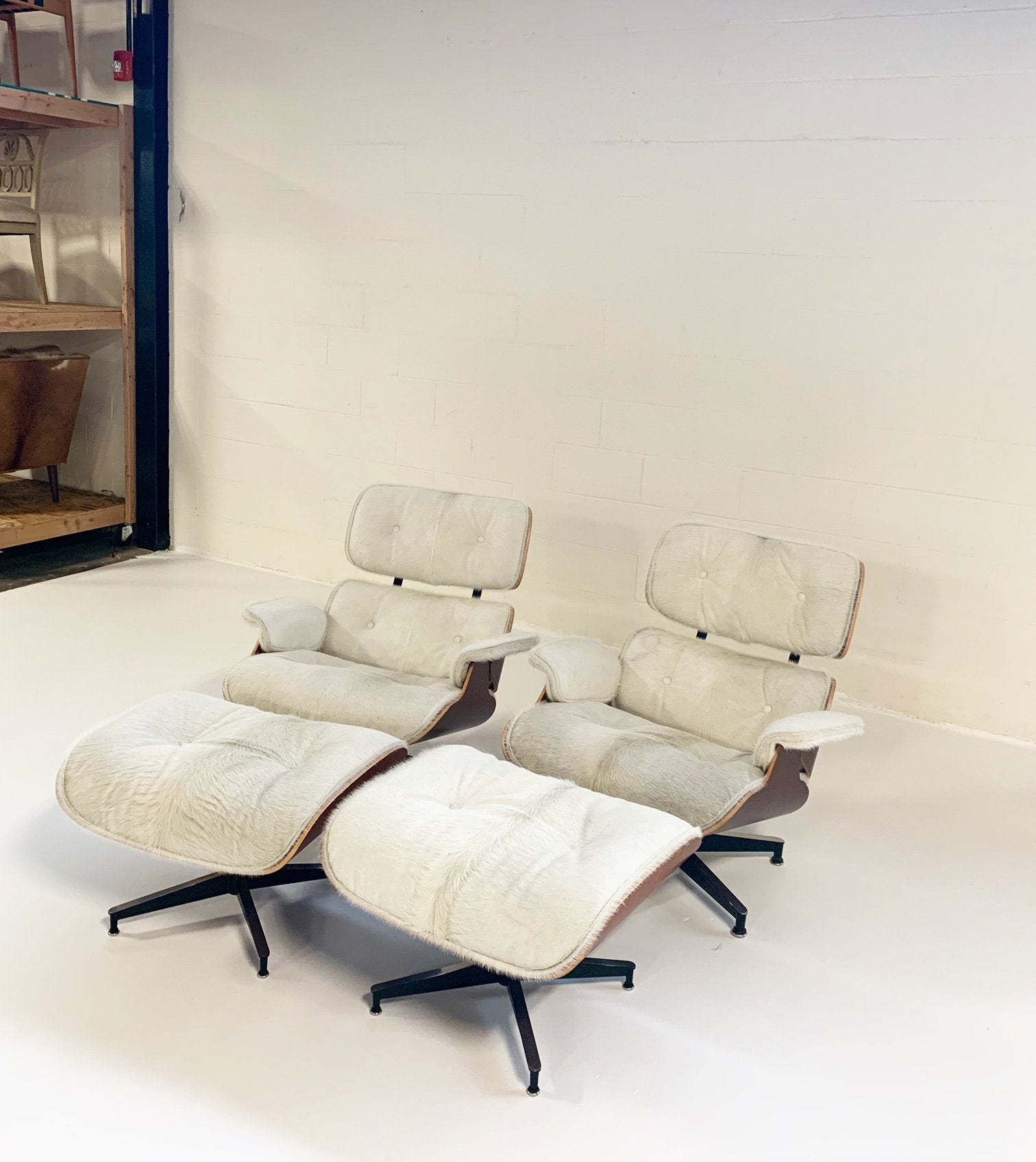 Charles and Ray Eames for Herman Miller 670 Lounge Chairs and 671 Ottomans in Brazilian Cowhide