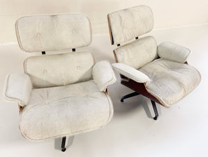 Charles and Ray Eames for Herman Miller 670 Lounge Chairs and 671 Ottomans in Brazilian Cowhide