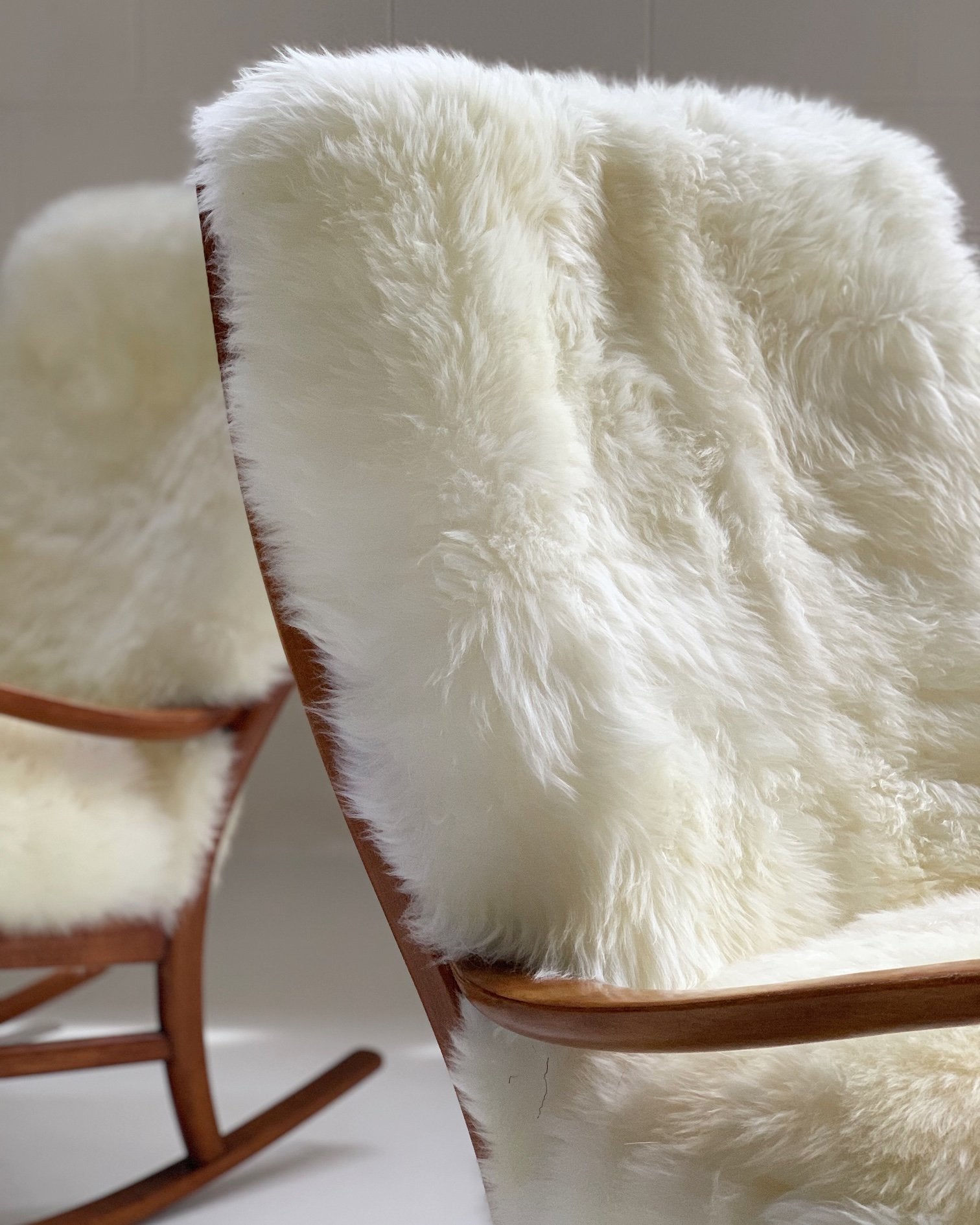 Parker Knoll Rocking Chairs with New Zealand Sheepskin Cushions