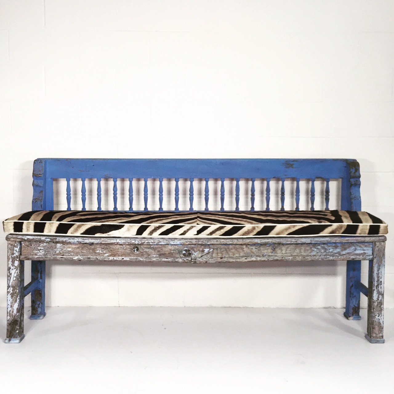 VINTAGE BLUE FARMHOUSE BENCH WITH ZEBRA HIDE CUSHION