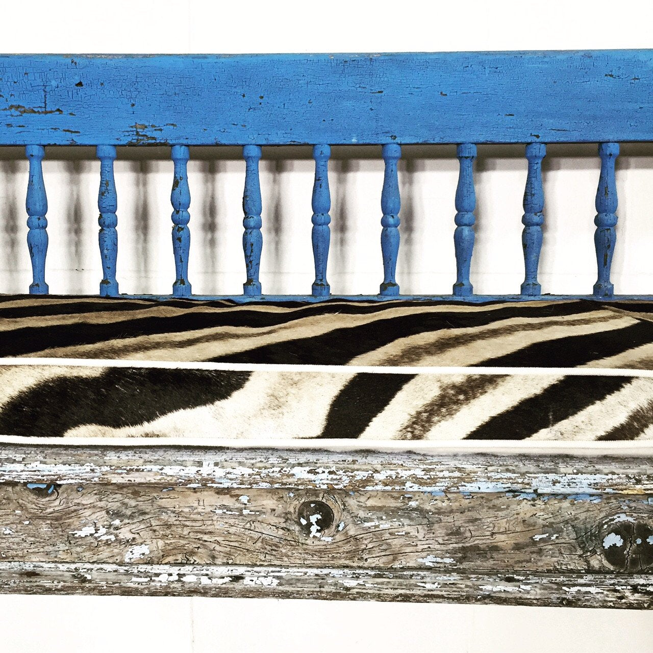 VINTAGE BLUE FARMHOUSE BENCH WITH ZEBRA HIDE CUSHION