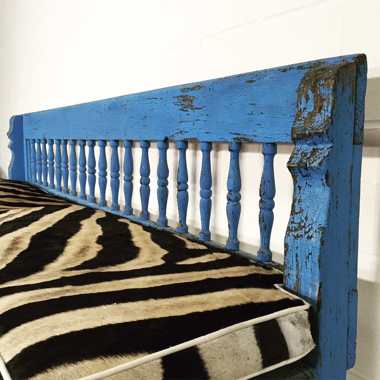 VINTAGE BLUE FARMHOUSE BENCH WITH ZEBRA HIDE CUSHION