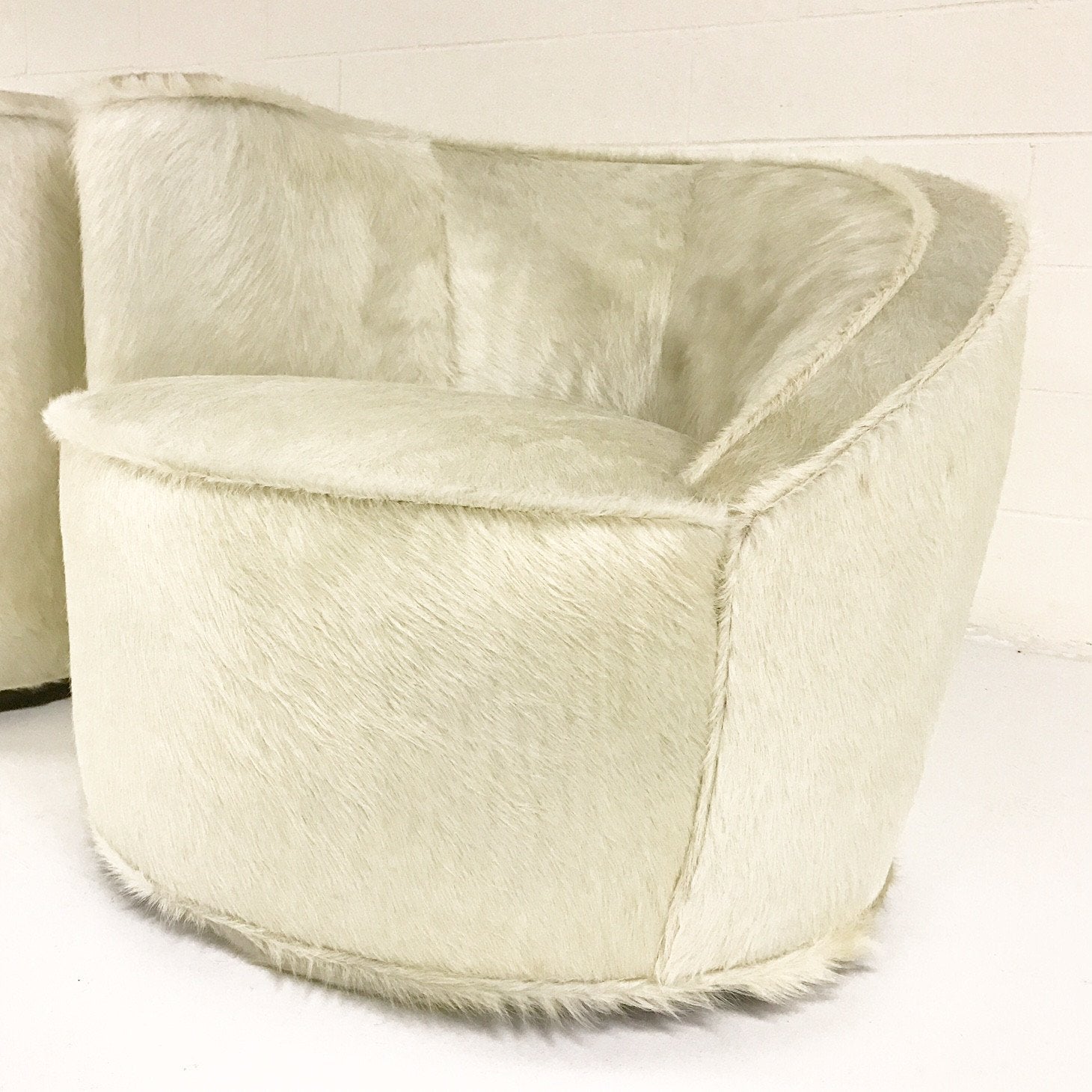 Pair of Vladimir Kagan Nautilus Chairs in Ivory Brazilian Cowhide
