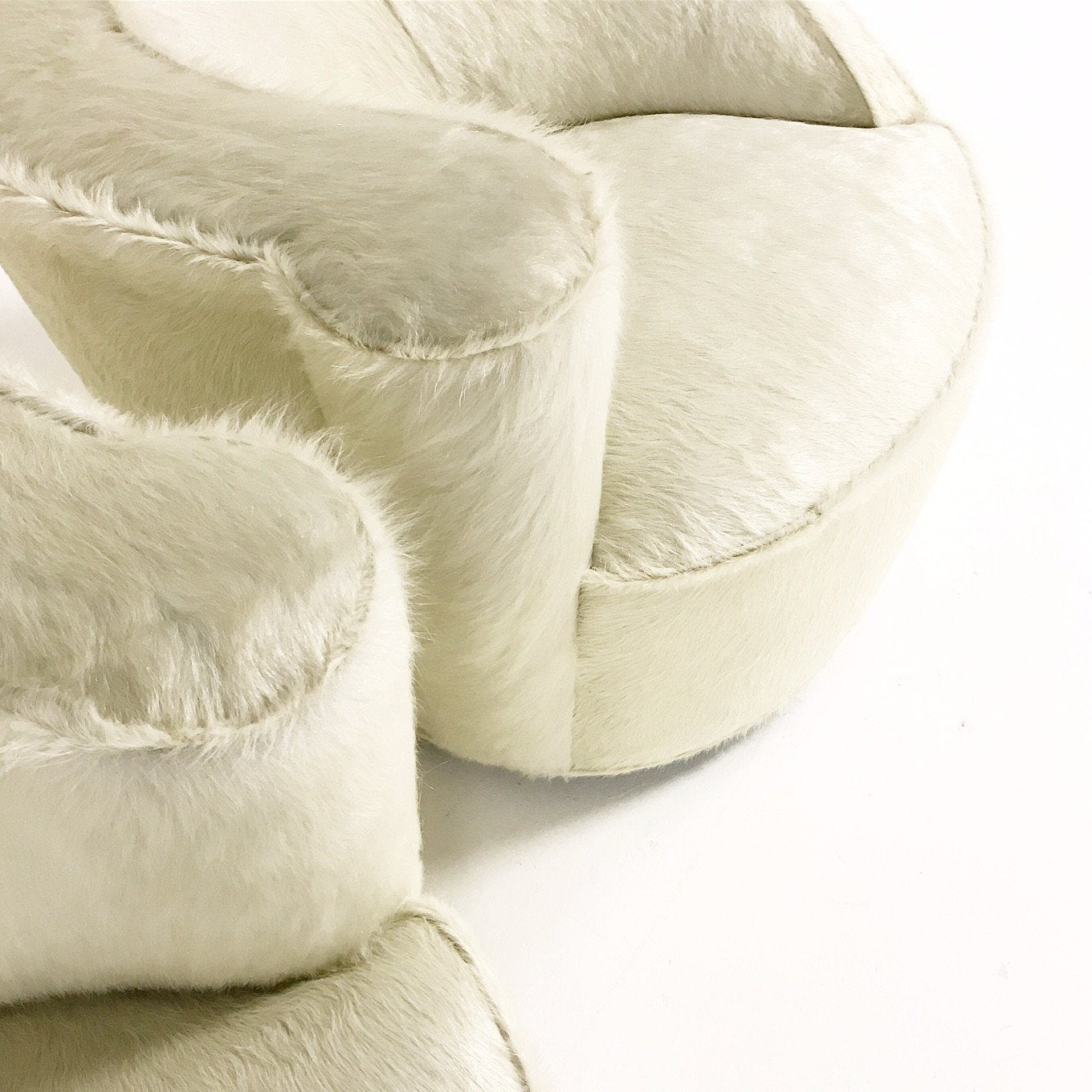 Pair of Vladimir Kagan Nautilus Chairs in Ivory Brazilian Cowhide