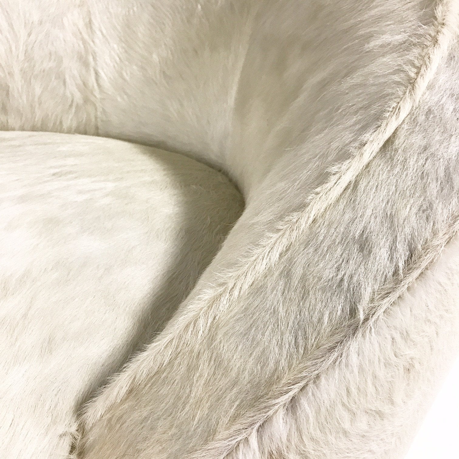 Pair of Vladimir Kagan Nautilus Chairs in Ivory Brazilian Cowhide
