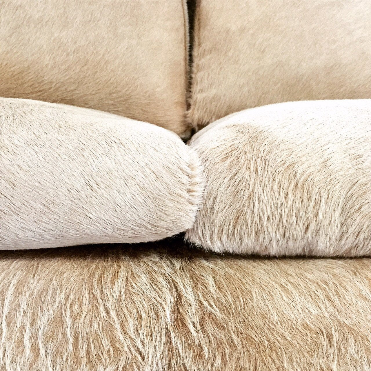 DANISH STYLE LOVESEAT in Brazilian Cowhide