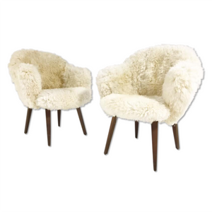 Pair of Eero Saarinen Executive Armchairs for Knoll with Walnut Legs Reupholstered in Brazilian Sheepskin